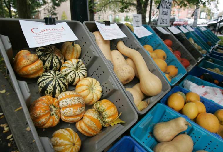 A variety of winter squash are available at the farmer's market in Portland, Ore., Wednesday, Oct. 10, 2007.   Plans to build year-round, sheltered markets are underway in cities including Portland, Boston, Pittsburgh and Chicago. (AP Photo/Don Ryan)